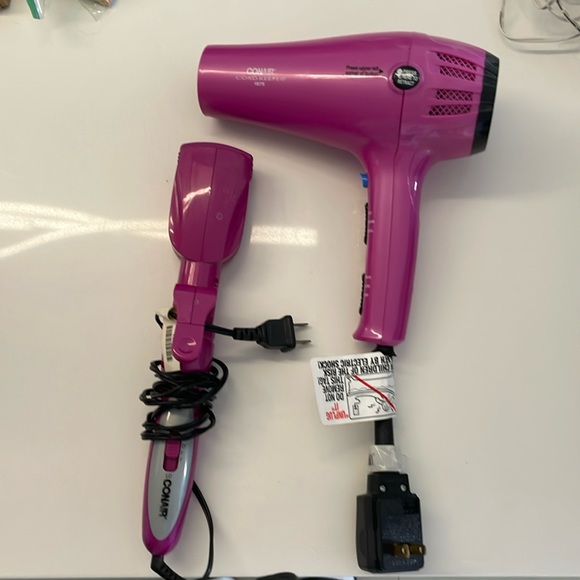 Pink conair hair dryer and straightener